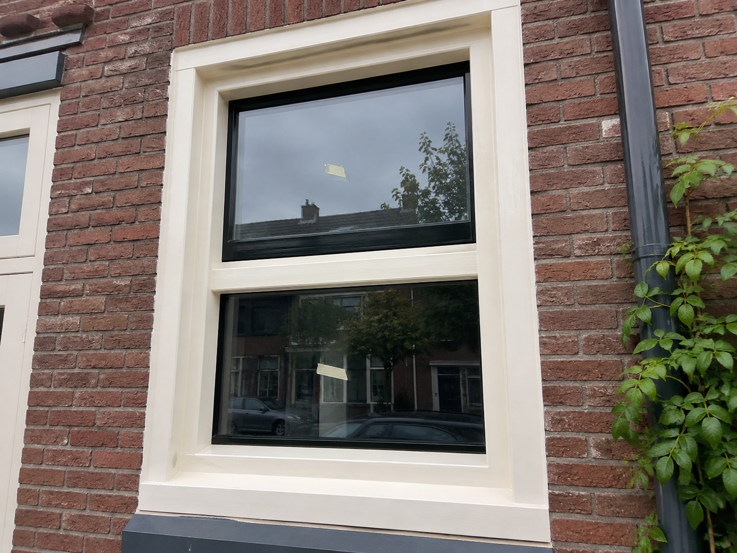 Geschilderd kozijn met bovenlicht